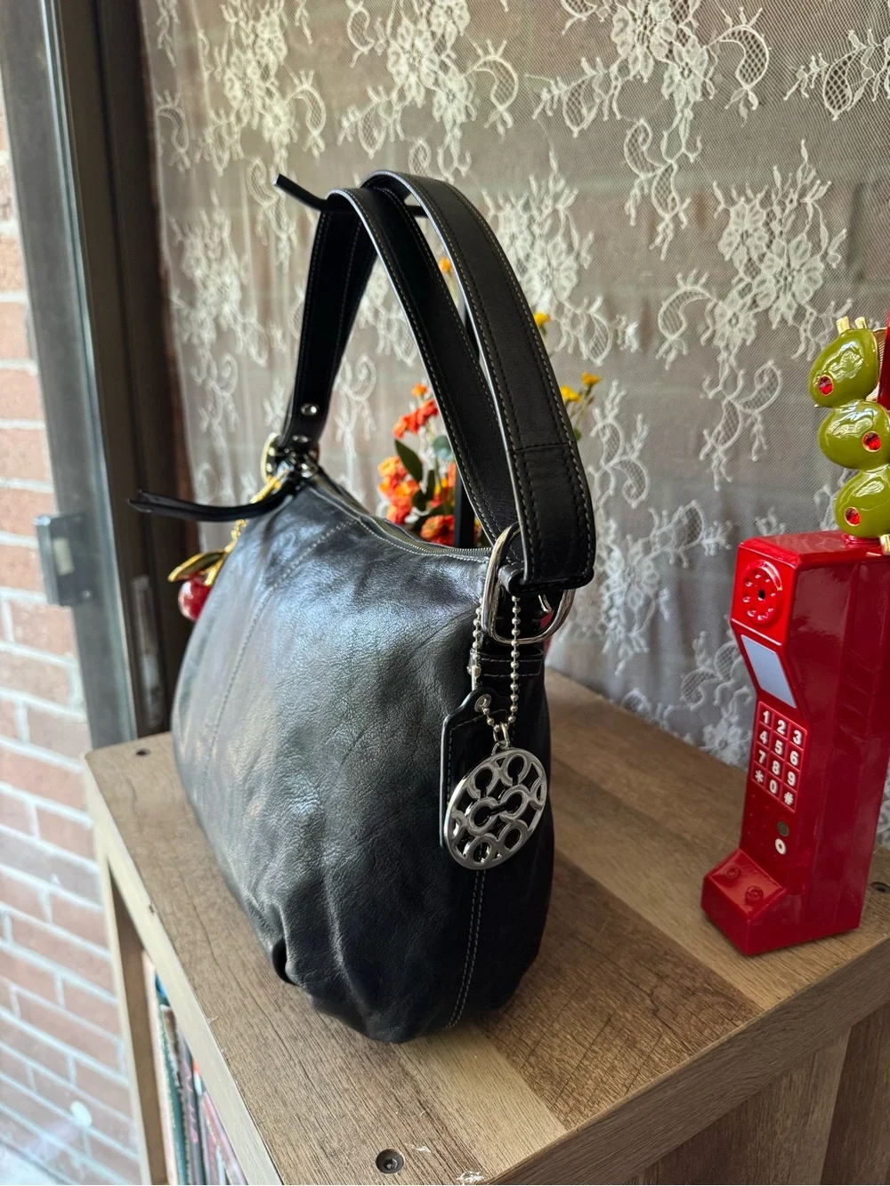 Coach Black Leather Shoulder Bag with Cherry Charm